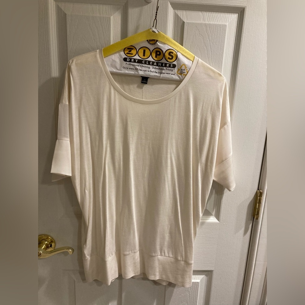 Ann Taylor rayon beige dressy tee with sheer inserts.  Size medium.  Excellent​